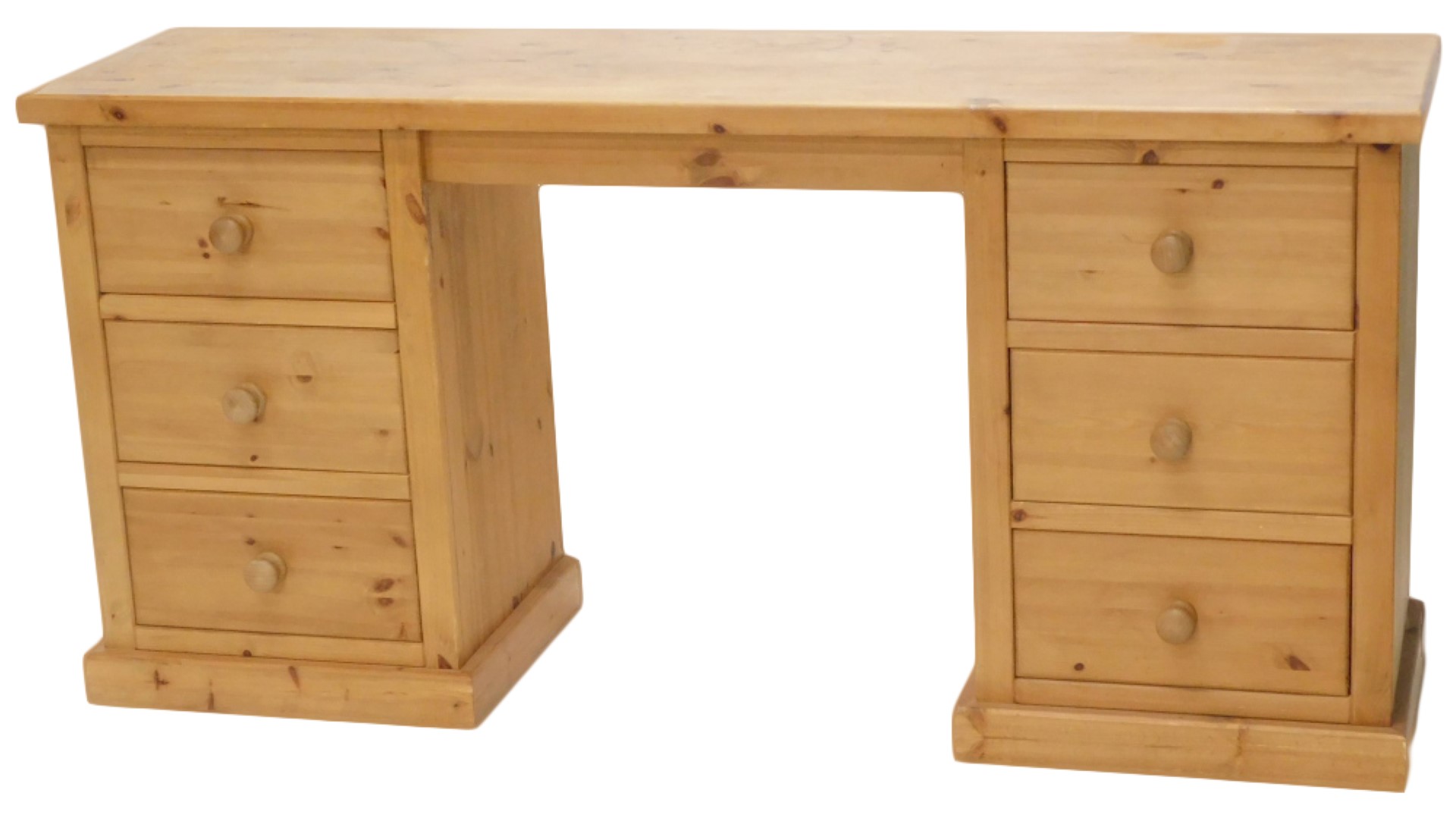 A pine dressing table or desk, with six drawers, on a plinth, 78cm high, 160cm wide.