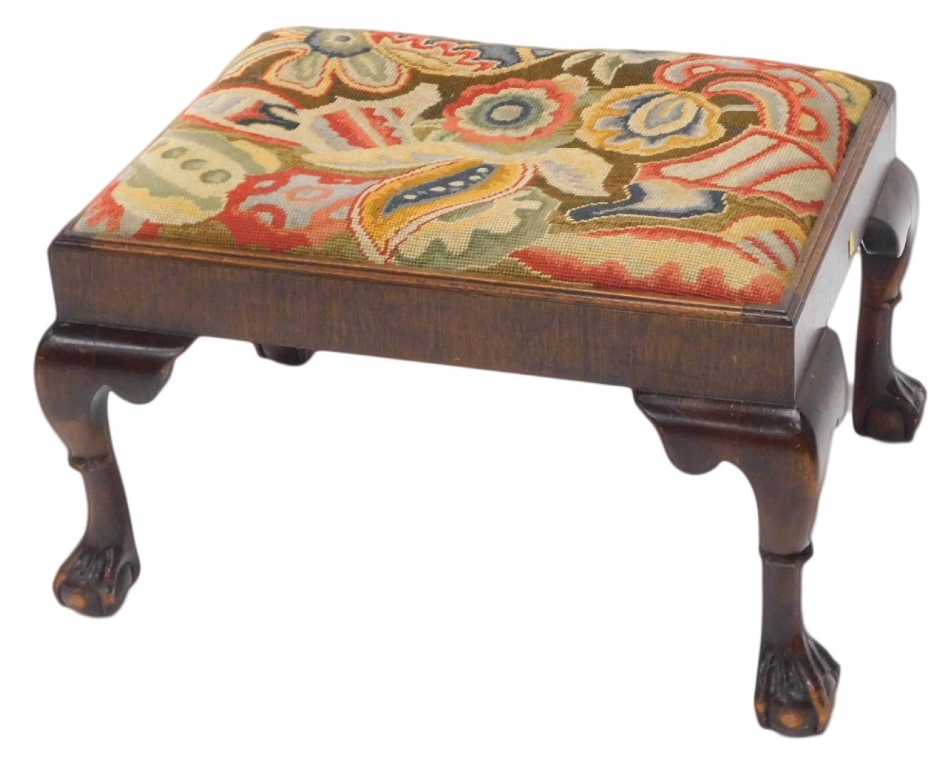 A mahogany stool, in Georgian style, with embroidered woolwork top, on cabriole legs with ball and c