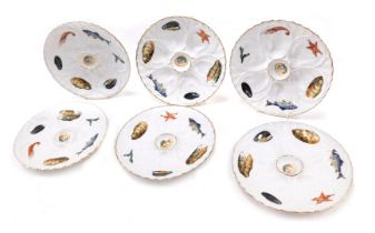 A set of six French Schomette Pilivite oyster plates, each printed with fish, shellfish, crustaceans