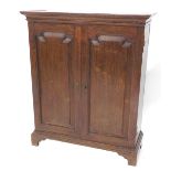 A George III oak side cabinet, two doors, each with arch panels on bracket feet, 84cm high, 79cm wid