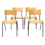 A set of four 1950s/60s brown painted metal and plywood stacking chairs.