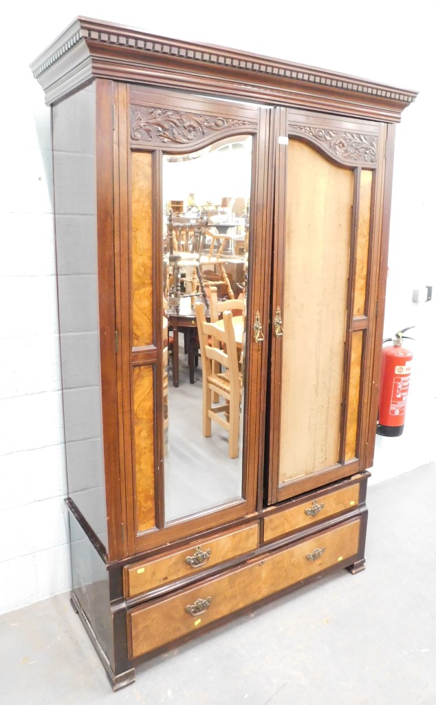 A Victorian mahogany double wardrobe, with burr walnut two single drawer and long drawer base. (AF)