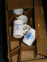 A group of Bradford Trust Lincoln mugs.