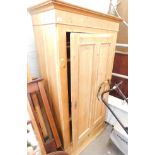 A Victorian stripped pine single wardrobe, on drawer base, 171cm high, 92cm wide, and 50cm deep.