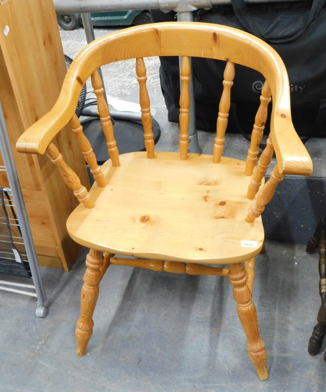 A pine captain's chair.
