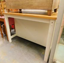 A pine effect top and white painted kitchen island.