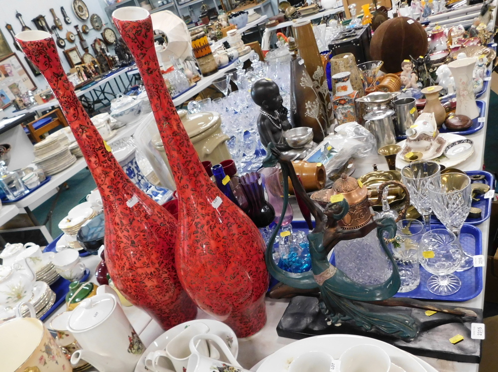 A pair of Eastern red decorated ceramic vases, and an Art Deco style figure of a dancing lady. (3)