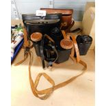 Two pairs of cased binoculars, comprising a Tecnar 8x30 binocular, and a Regent 8x30 binocular, each