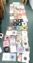 A group of 45rpm records, to include John Lennon, Rolling Stones, Laughing Tonight, and others. (1 b