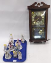 A President wall clock, two Leonardo collection Bavarian type figures, Continental porcelain seated