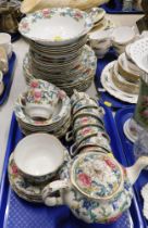 A Booths Floradora pattern part tea service, comprising dinner plates, side plates, bowls, cups, sau