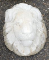 A reconstituted stone lion mask, 36cm high.