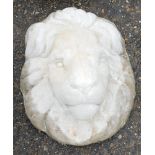 A reconstituted stone lion mask, 36cm high.