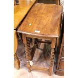 An oak barley twist column side table.