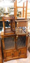 An oak short display cabinet, sewing box, nest of three tables and a stool. (4)