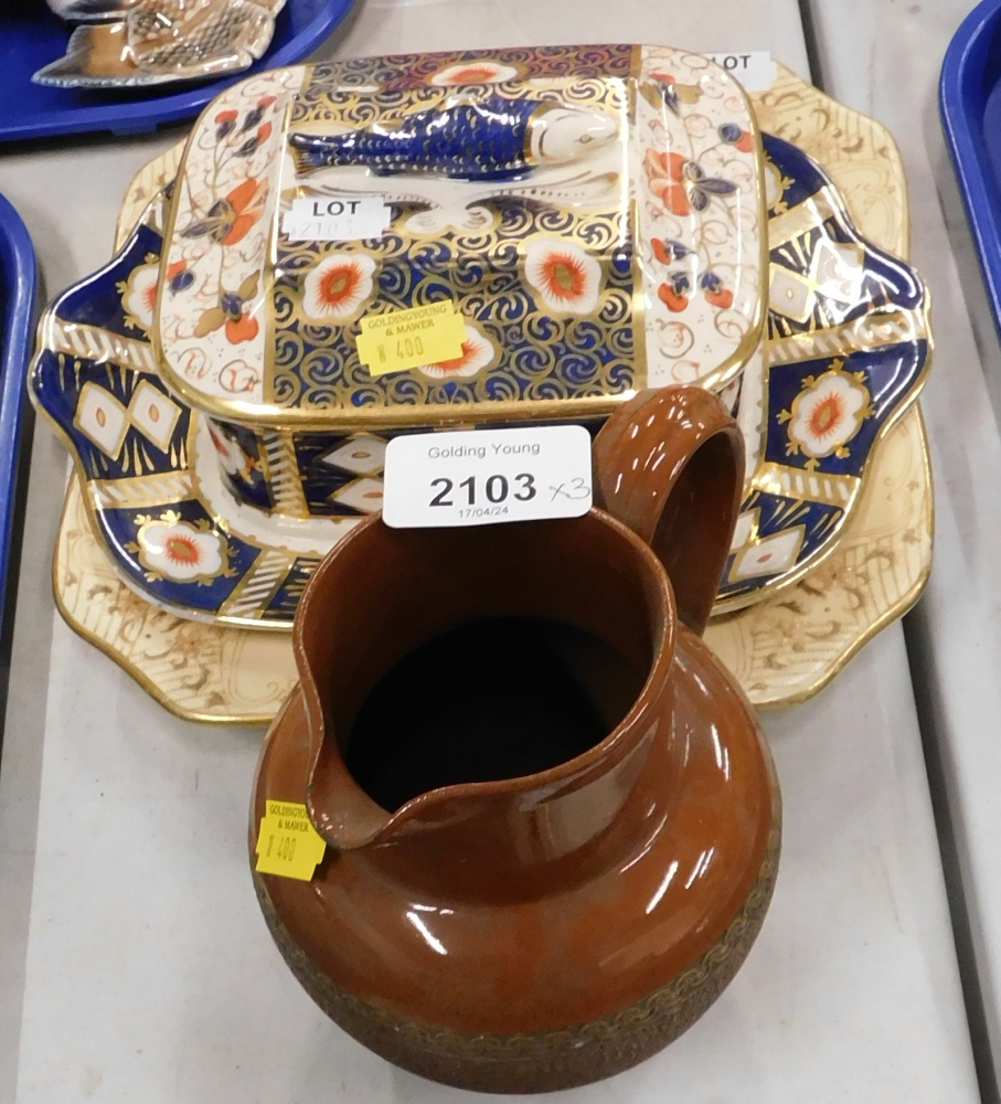 A Doulton one pint brown stoneware jug, an Imari pattern fish tureen and cover, and a Doulton Bursle