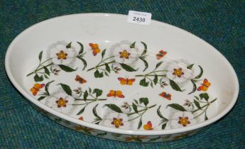 A Portmerion oval serving plate, with butterflies and daisies, 37cm diameter.