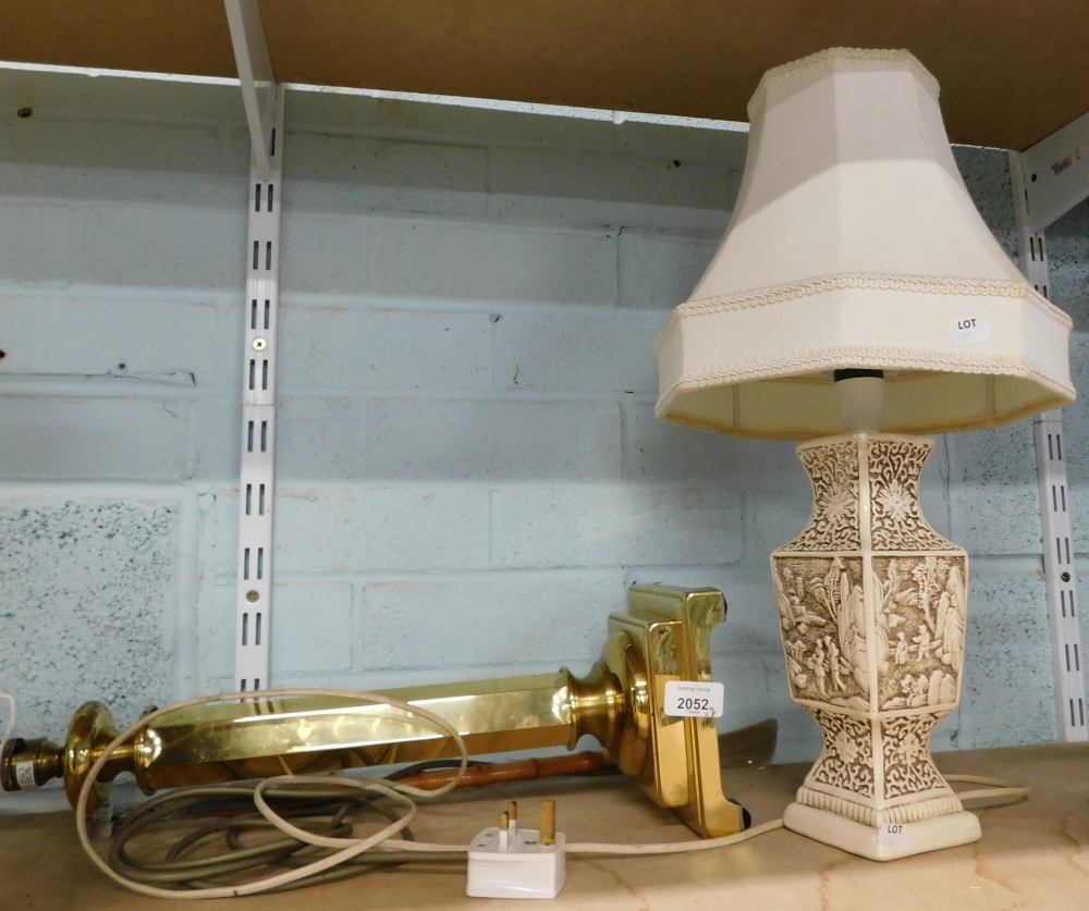 A brass columned table lamp, on twist stem on square foot, 40cm high, and a ceramic white finish tab
