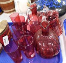 Victorian cranberry glasswares, comprising a pair of Victorian cranberry glass jugs, 16cm high, a cr