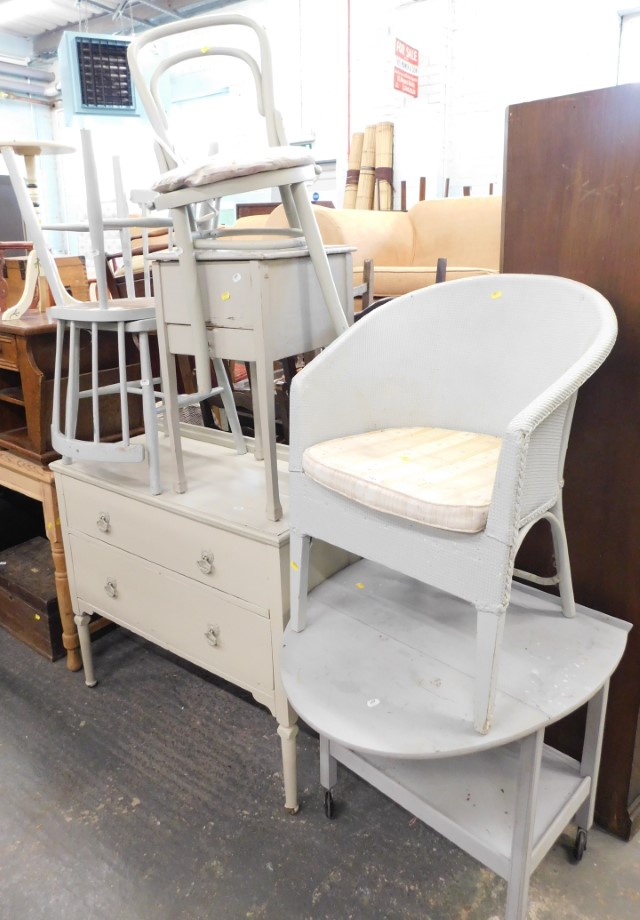 A painted tea trolley, basket weave chair, three side chairs, bedside cabinet, and two drawer chest.