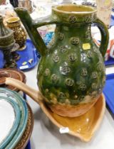 A stoneware green water vessel, with circle cross detail, leaf moulded lip bowl, 33cm high. (2)