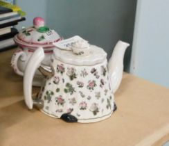 Withdrawn pre-sale. Two miniature ceramics, comprising a Portmerion miniature teapot, on a white