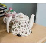 Withdrawn pre-sale. Two miniature ceramics, comprising a Portmerion miniature teapot, on a white