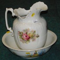 A 1960s wash jug and bowl, with transfer printed rose decoration.