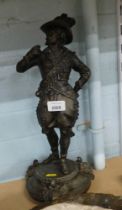 A late 20thC reproduction bronzed figure of a gentleman, in evening dress with whistle, on circular