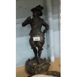 A late 20thC reproduction bronzed figure of a gentleman, in evening dress with whistle, on circular