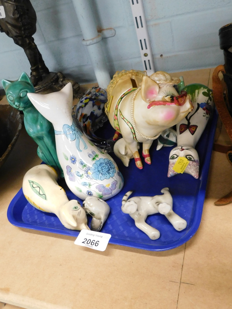 A group of animal ornaments, comprising mainly cats, a lustre money bank pig, and a glass fish. (1 t