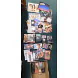 Cassettes, videos, and records, to include Michael Jackson, Poison, Kylie Minogue, and others. (1 bo