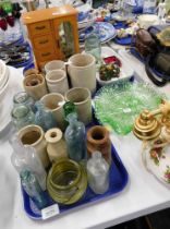 Stoneware and glass bottles, two flared carnival glass type bowls, a Royal Worcester Evesham rectang