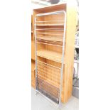 Two modern finish pine effect low bookcases, 93cm high, 78cm wide, 30cm deep, and a hanging clothes