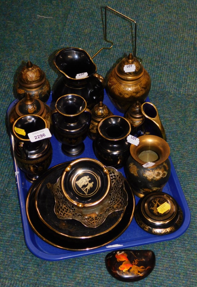 Egyptian wares, comprising black and gilded jugs and vases, mottled jars and covers. (1 tray)