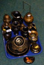 Egyptian wares, comprising black and gilded jugs and vases, mottled jars and covers. (1 tray)