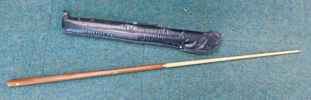 Cannon snooker cue and case.