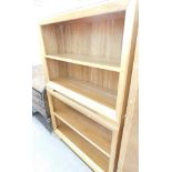 A pair of modern finish beech bookcases, 86cm high, 115cm wide, 38cm deep.