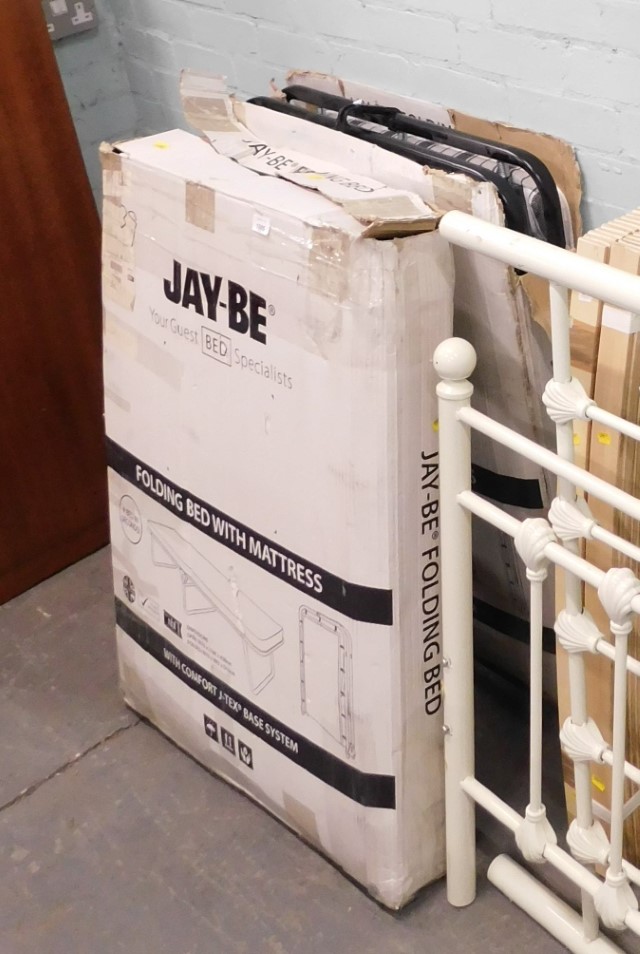 Two Jay-Be folding guest beds, boxed.