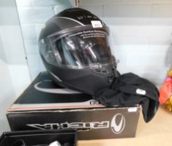 A Black Titan SV motorcycle helmet, model Titan SV, size 58 medium, with material slipcover, and Ric