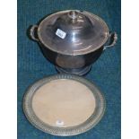 A Walker and Hall silver plated circular tureen and cover, and a plated and reeded bread board. (2)