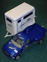 A Brey toy horse box and blue Jeep. (2)