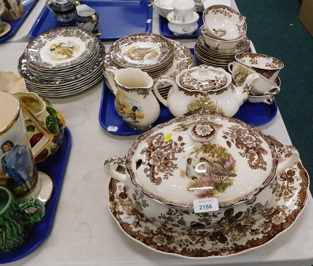 A Royal Worcester Palissy Game series dinner service, comprising teapot, two handled cups, saucers,