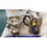 A hammered English pewter Art Nouveau style three piece coffee set, comprising coffee pot, milk jug,