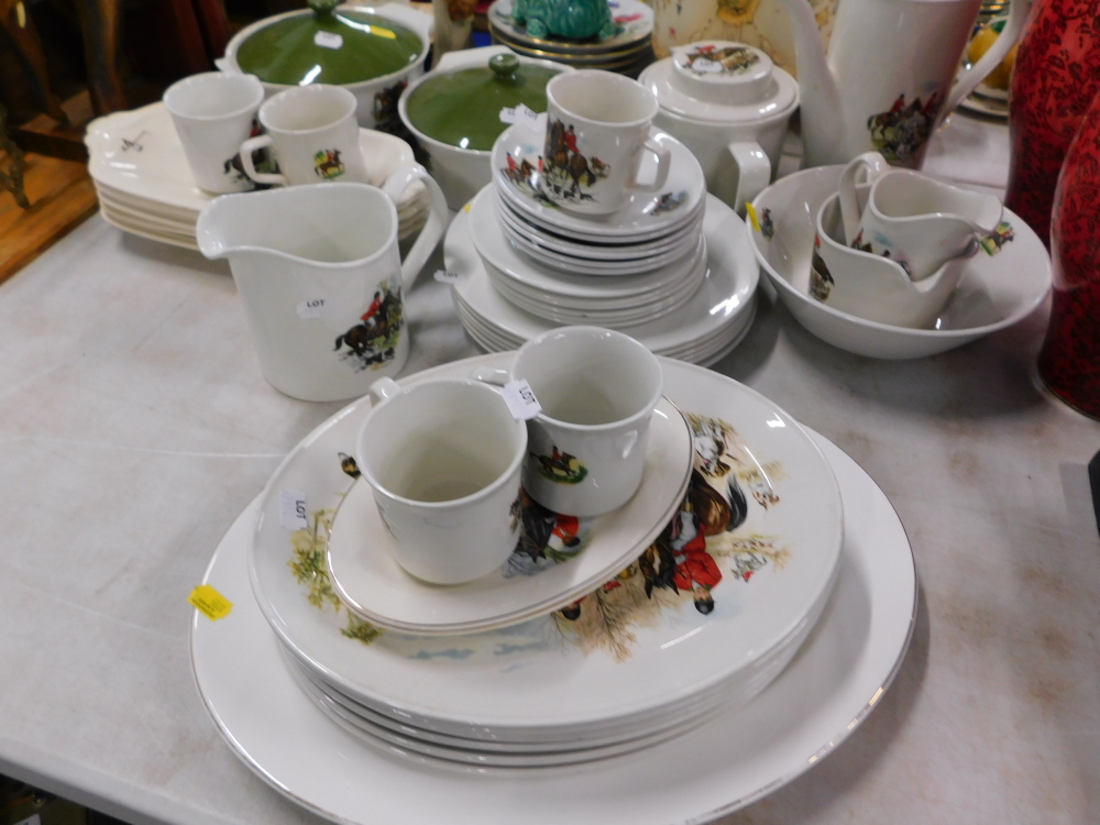 A mixed set of hunting scene dinnerware, comprising coffee pot, teapot, two tureens and covers, serv