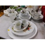 A mixed set of hunting scene dinnerware, comprising coffee pot, teapot, two tureens and covers, serv