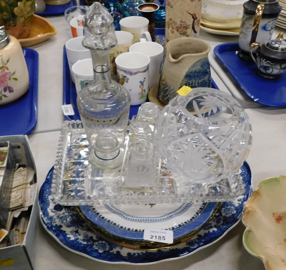 An oval blue and white meat platter, collectors plates, glass dressing table jar, a star cut vase, d