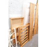 An ash single bed frame, with under drawer storage.