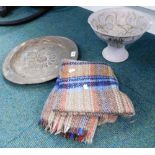 A hammered brass charger, Studio Pottery tulip centre bowl, and a chequered blanket. (3)