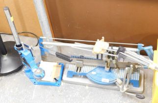 A Cupper Perfekt mitre saw, and a drill stand. (2)